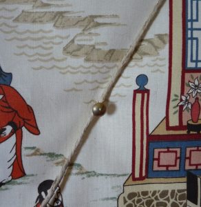 Putting laid cord on a pin board using discoverupholstery.co.uk supplies
